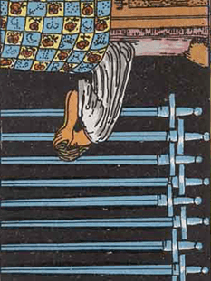 Tarot karta Devetica meči — obrnjeno