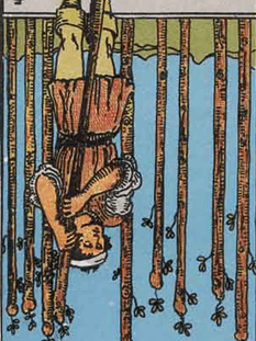 Tarot karta Devetica palice — obrnjeno
